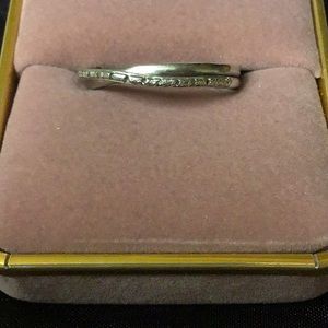 Genuine diamond and sterling silver ring.